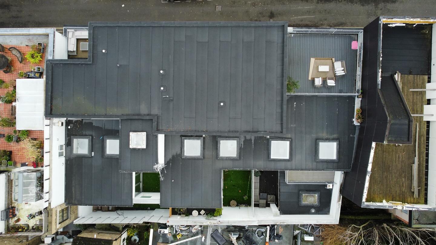 Flat roof with skylights by Henleys Roofing